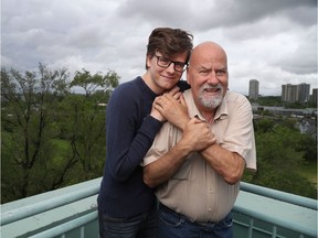 Gregory Soutar and his son, Ryan, pose for a photo at their apartment on Friday.