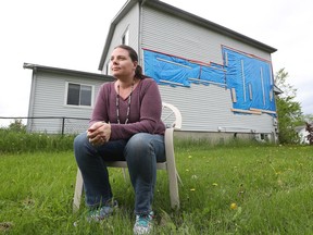 Grace Campbell outside her damaged home in Dunrobin. Her  family has been living in a rental since a tornado slammed into Dunrobin on Sept. 21, 2018.