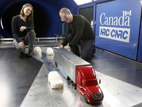National Research Council of Canada research officers Hali Barber and Brian McAuliffe work in a wind tunnel at the NRC in Ottawa Friday March 22, 2019.   Tony Caldwell