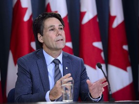 Dr. Eric Hoskins, Chair of the Advisory Council on the Implementation of National Pharmacare, speaks during a press conference in Ottawa June 12. The council's report is good news for patients.
