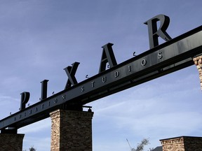 The Pixar logo is seen at the main gate of Pixar Animation Studios January 19, 2006 in Emeryville, California.