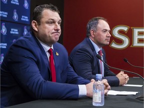 General manager Pierre Dorion, seen here with new head coach D.J. Smith during a media conference in May, says the Senators will get a player who will play in the NHL eventually with the No. 19 pick in the draft on Friday night.