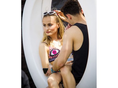 Luca Pallotta and Brigitte Lefebvre snuggle up together at Escapade Music Festival Saturday, June 22, 2019 at Lansdowne Park.  Ashley Fraser/Postmedia