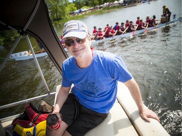 The Ottawa Dragon Boat Festival was held over the weekend on the Rideau River at Mooney's Bay. John Brooman, CEO of Ottawa Dragon Boat Festival, took his first  view of the event from the water in the media boat Saturday morning.   Ashley Fraser/Postmedia