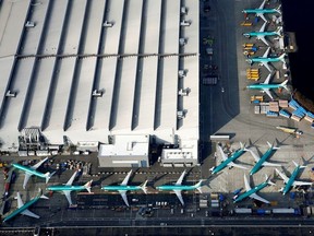 An aerial photo shows Boeing 737 MAX airplanes parked on the tarmac at the Boeing Factory in Renton, Washington, U.S. March 21, 2019. REUTERS/Lindsey Wasson/File Photo GLOBAL BUSINESS WEEK AHEAD ORG XMIT: BWA18