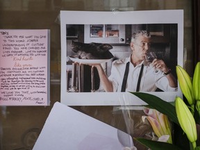 Notes, photographs and flowers are left in memory of Anthony Bourdain at the closed location of Brasserie Les Halles, where Bourdain used to work as the executive chef, June 8, 2018 in New York City. Bourdain, a writer, chef and television personality, was found dead in his hotel room in France. His employer CNN confirmed the death as a suicide.