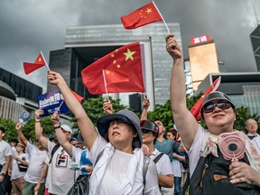 Tens of thousands of demonstrators gather outside Legislative Council Complex to show their support to the police as they fought largely young demonstrators opposed to a now postponed plan to allow extraditions to the Chinese mainland.
