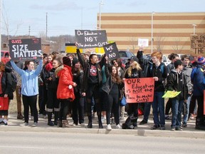 Sacred Heart High School students marched to Walkerton District Community School in Walkerton to join forces to protest Premier Doug Ford's education cuts.