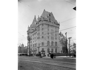 Photograph of Chateau Laurier Hotel in the final stages of completion in late 1911. The hotel was opened officially in June 1, 1912, delayed six weeks by the drowning on the Titanic of Charles Melville Hays, general manager of the Grand Trunk Railway, owner of the hotel.