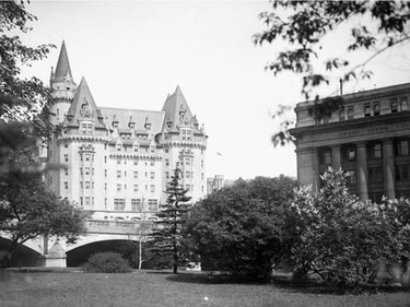 Chateau Laurier Hotel in photograph taken from the Driveway, with corner of Union train station at right. Circa 1915