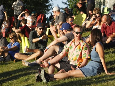 Fans relax at the Spin Stage at Bluesfest in Ottawa on Sunday.
