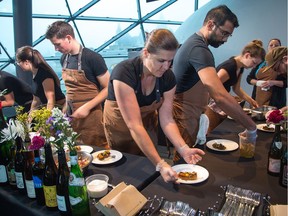 Chefs prepare food as ten different chefs compete in Canada's Great Kitchen Party with their unique dishes at the Shaw Centre.