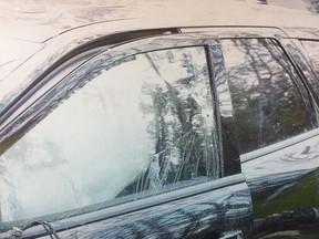 Court Exhibit - Photo showing bullet hole in window of German tourist Horst StewinÕs SUV.