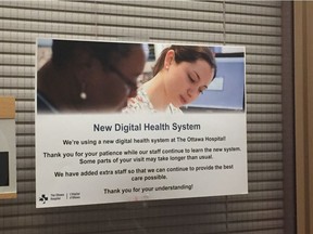 Posters warning patients about the new EPIC records system dot the hallways at the General Campus of the Ottawa Hospital.