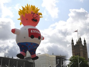 A Boris blimp is flown in Parliament Square during the "No To Boris, Yes To Europe" March on July 20, 2019 in London, England. Anti-Brexit campaigners gathered to march through central London today with the message "say no to Boris and yes to Europe" and demand an end to Brexit. The march comes just days ahead of Boris Johnson's widely expected win to become Prime Minister in the Conservative Leadership Campaign.