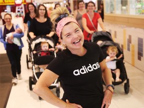 Jules Sherlock leads moms in doing exercises at the St. Laurent Mall several times a week.