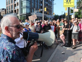 Demonstrators against the closed sidewalk and lack of movement at the Magee House in Ottawa, July 24, 2019.   Photo by Jean Levac/Postmedia News 131976