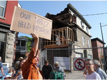 Demonstrators against the closed sidewalk and lack of movement at the Magee House in Ottawa, July 24, 2019.   Photo by Jean Levac/Postmedia News 131976