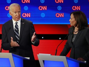 Candidates former vice-president Joe Biden and U.S. Senator Kamala Harris on the second night of the second 2020 Democratic U.S. presidential debate in Detroit, Michigan, July 31, 2019. REUTERS/Lucas Jackson