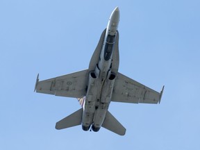 Files: A CF-18 fighter jet does a flypast as Canada Day activities are in full swing through out the downtown core.