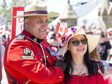 Whats more Canadian than getting a photo with a Mountie as Canada Day activities are in full swing through out the downtown core.