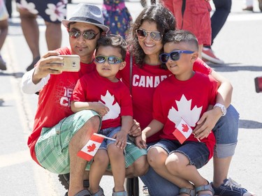 Pula Choudhury and his family of wife Moumita, sons Ayush and Adrik pose for a selfie on Wellington Street as Canada Day activities are in full swing through out the downtown core.