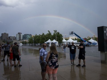 A rainbow pops out of the clouds following the severe weather warning as the second day of RBC Bluesfest gets going on Friday evening.