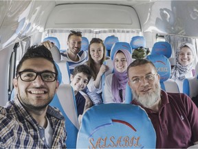 The Madkor family in Egypt hosted Americans Jason Reynolds and Jenna Day, top left, in the film Free Trip To Egypt, which opens at the ByTowne July 19/19.