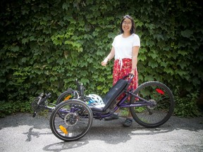 Thuy Do with her beloved Catrike bike Saturday, July 13, 2019. Do's bike was stolen from her July 2 and was returned Friday night to police. Do says it will be hard hard to top getting her bike back as she celebrates her birthday this week.