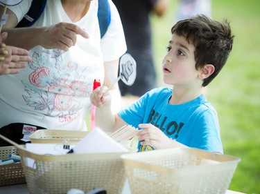Six-year-old Toomy Moussa enjoys the special event Saturday afternoon.   Ashley Fraser/Postmedia