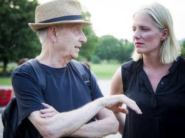 Architect and activist Barry Padolsky speaks with Environment Minister Catherine McKenna during the event organized by actor-comedian Tom Green to show their opposition to the proposed Château Laurier Hotel addition.