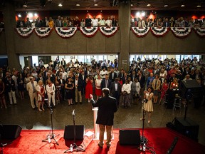 Deputy chief of mission Richard Mills addressed the large crowd at the NAC Thursday.