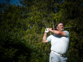 Jim Hemlin, COO of Calabogie Peaks Resort, watches his ball fly down the course.