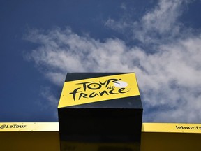 A picture taken on July 18, 2019 shows the top of the podium displaying the logo of the Tour de France during the twelfth stage of the 106th edition of the Tour de France cycling race between Toulouse and Bagneres-de-Bigorre.