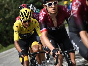 Colombia's Egan Bernal, wearing the overall leader's yellow jersey, rides in the pack during the 20th stage of the 106th edition of the Tour de France cycling race between Albertville and Val Thorens, in Val Thorens, on July 27, 2019.