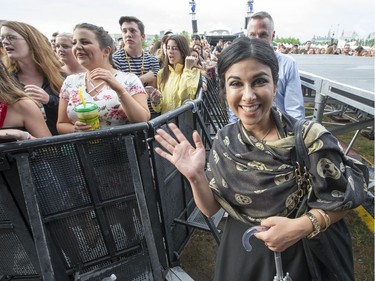 Goldie Ghamari, MPP for Carleton, who replaced Lisa MacLeod as a government representative, arrives at the city stage following a severe thunderstorm that blew through Ottawa on day 7 of RBC Bluesfest. Photo by Wayne Cuddington/ Postmedia