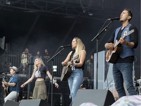 Gone West, composed of (from left) Jason Reeves, Nelly Joy, Colbie Caillat and Justin Young, performing on the city stage following a severe thunderstorm that blew through Ottawa on day 7 of RBC Bluesfest.