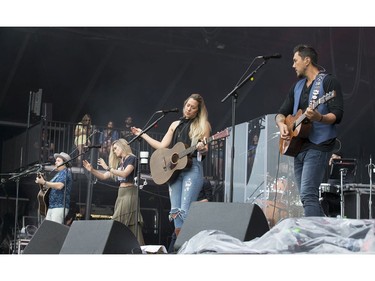Gone West, composed of (from left) Jason Reeves, Nelly Joy, Colbie Caillat and Justin Young, performing on the city stage following a severe thunderstorm that blew through Ottawa on day 7 of RBC Bluesfest. Photo by Wayne Cuddington/ Postmedia