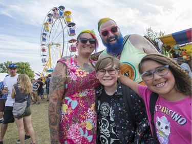 Laura Schwarzkopf (from left), Otto Gauvreau, 10, Jason Mousseau and Paisley Gauvreau, 8, enjoy a family outing to Bluesville on day 6 of RBC Bluesfest. Photo by Wayne Cuddington/ Postmedia