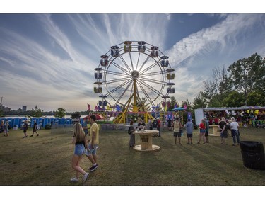 The ferris wheel in Bluesville at dusk  on day 6 of RBC Bluesfest. Photo by Wayne Cuddington/ Postmedia