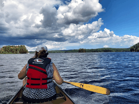 FILE: Out on the water in a canoe.