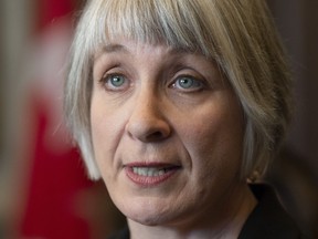 Employment, Workforce Development and Labour Minister Patty Hajdu comments on the Ontario budget in the Foyer of the House of Commons in Ottawa, Friday April 12, 2019. he federal government is committing nearly $2.8 million to a project aimed at reducing workplace harassment and promoting accountable work environments.