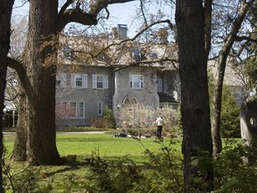 A gardener works on the grounds at the Prime Minister's residence at 24 Sussex Drive in Ottawa, Tuesday May 6, 2008. Nearly four years after Justin Trudeau opted not to move into the prime minister's official residence over concerns about its crumbling state, the building remains vacant short of staff who continue to use the kitchen to prepare meals for Trudeau and his family.