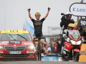 The 185-km Stage 15 of the Tour de France from Limoux to Foix Prat d'Albis on Sunday ends with Mitchelton-Scott rider Simon Yates of Britain celebrating victory.