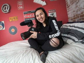YouTuber Elle Mills in her bedroom.