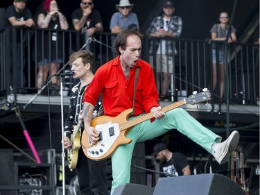 Luke Bentham (L) and Ross Miller of The Dirty Nil on the City Stage as day 8 of RBC Bluesfest takes place on the grounds on the Canadian War Museum in Ottawa. Photo by Wayne Cuddington/ Postmedia