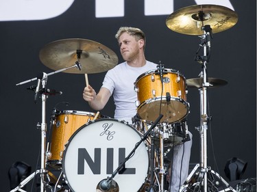 Kyle Fisher of The Dirty Nil on the City Stage as day 8 of RBC Bluesfest takes place on the grounds on the Canadian War Museum in Ottawa. Photo by Wayne Cuddington/ Postmedia