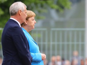 German Chancellor Angela Merkel receives Finland's new Social Democrat Prime Minister Antti Rinne with military honours at the Chancellery in Berlin, Germany, July 10, 2019.