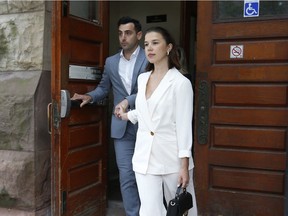 Jacob Hoggard and his wife, Rebekah Asselstine, leave Old City Hall court. Hoggard, the lead singer of the Canadian band Hedley, was in court for a preliminary hearing for sexual assault charges on Thursday July 11, 2019. Jack Boland/Toronto Sun/Postmedia Network