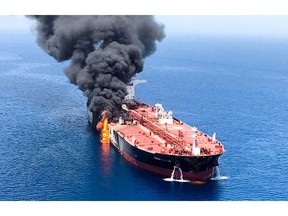 An oil tanker is seen after it was attacked at the Gulf of Oman, in waters between Gulf Arab states and Iran, June 13, 2019.